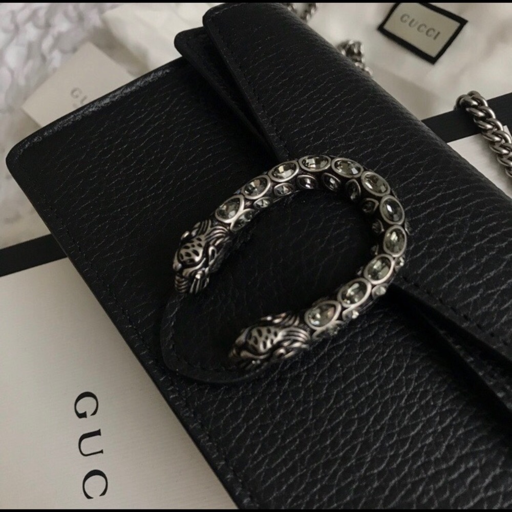 Gucci mini cross body bag.